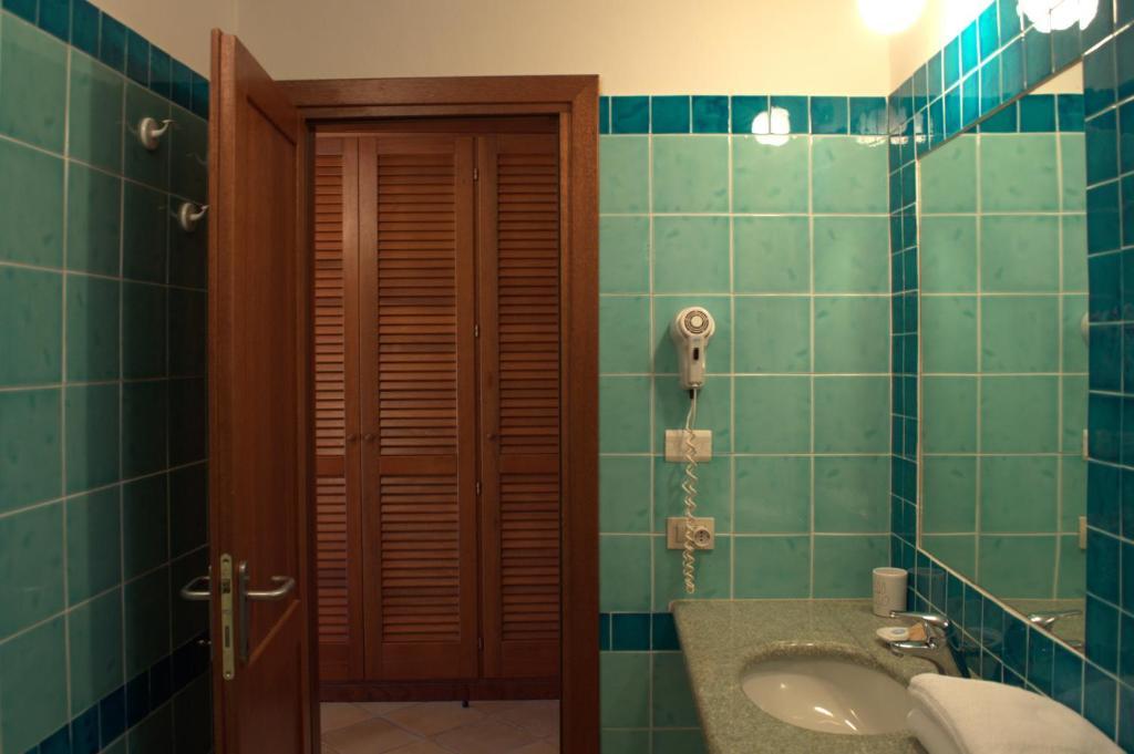 Cala Paradiso Residence San Teodoro  Zimmer foto